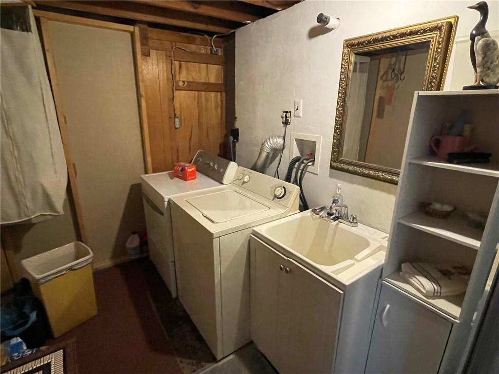 63 Locust Street McKees Rocks, PA 15136 - Photo 21 of 25 a utility room with dryer and washer