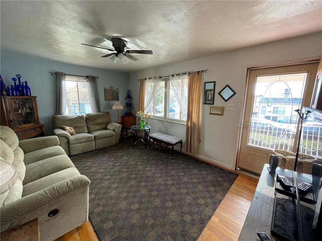 63 Locust Street McKees Rocks, PA 15136 - Photo 3 of 25 a living room with furniture and a window