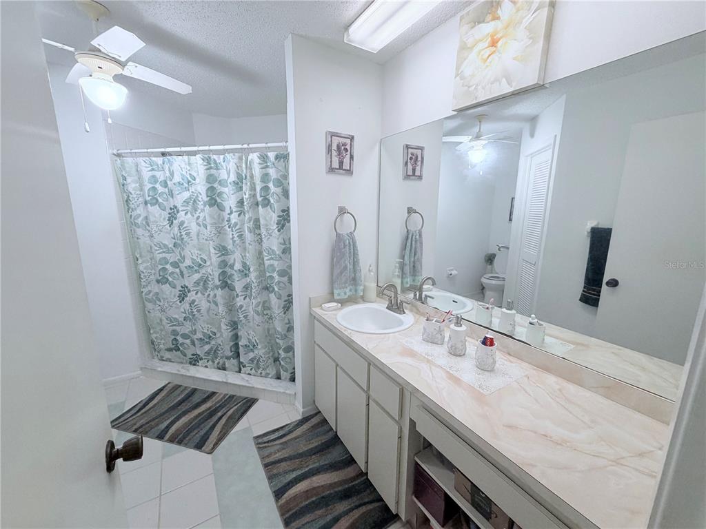 4523 Glen Hollow New Port Richey, FL 34653 - Photo 29 of 62 a bathroom with double vanity sink and a mirror