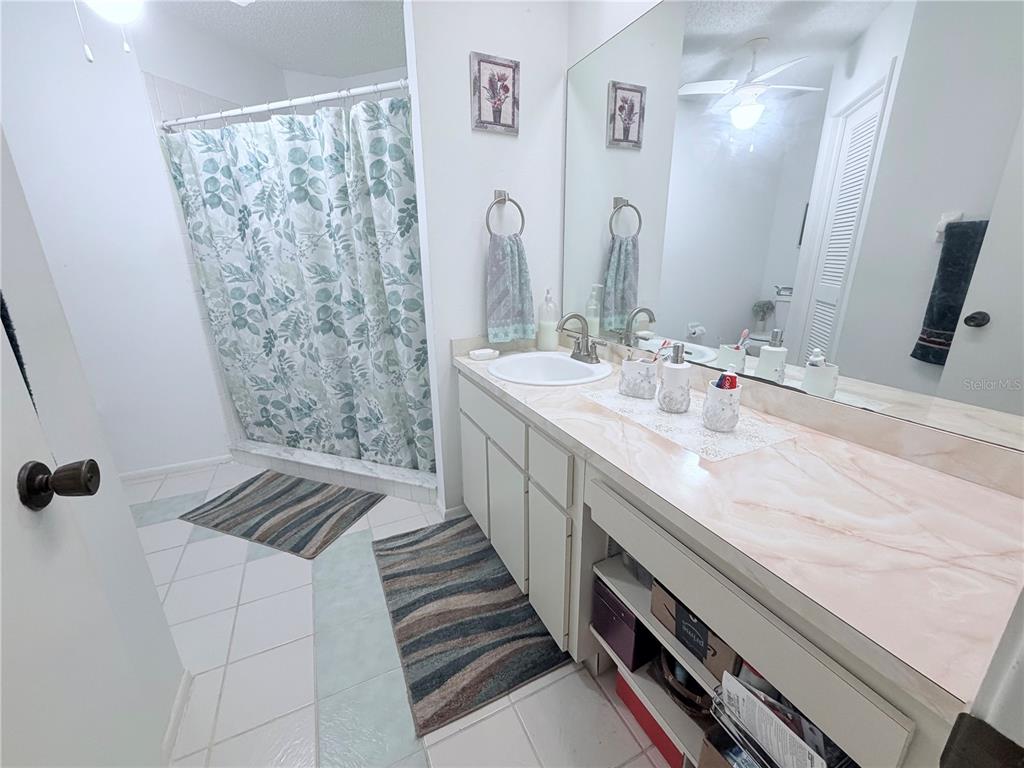 4523 Glen Hollow New Port Richey, FL 34653 - Photo 30 of 62 a bathroom with double vanity and a sink