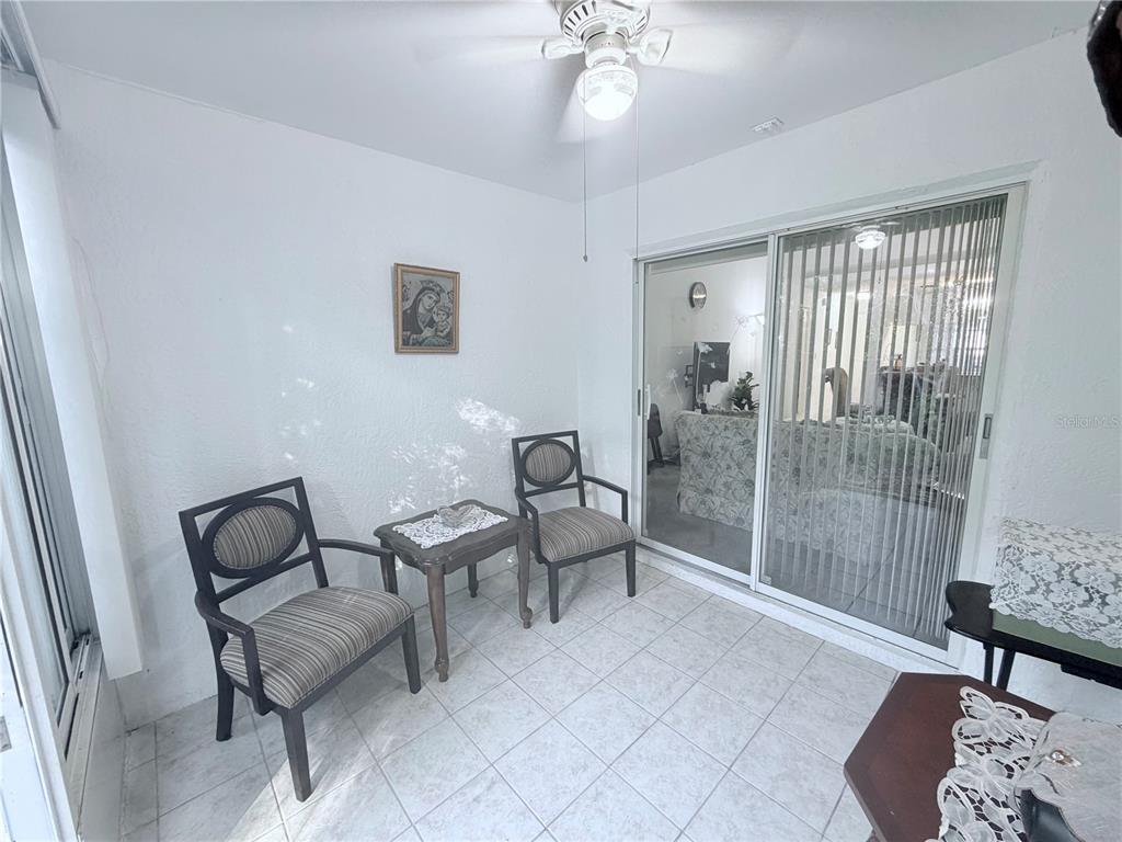 4523 Glen Hollow New Port Richey, FL 34653 - Photo 47 of 62 a living room with furniture and a window