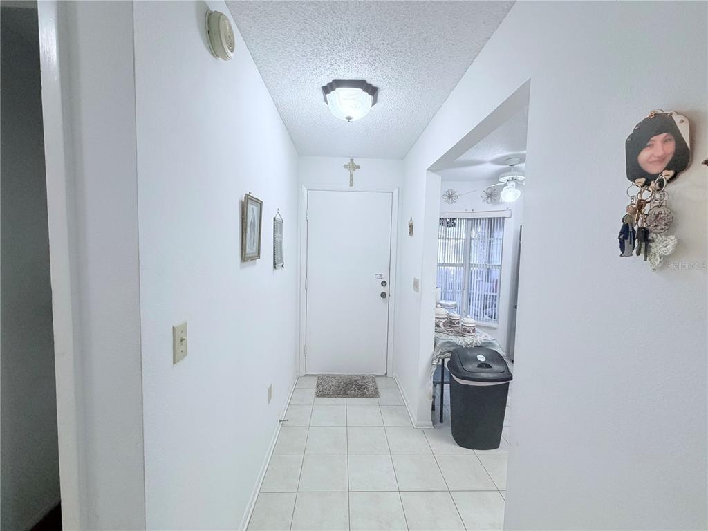 4523 Glen Hollow New Port Richey, FL 34653 - Photo 5 of 62 a view of a storage & utility room with sink dryer and washer