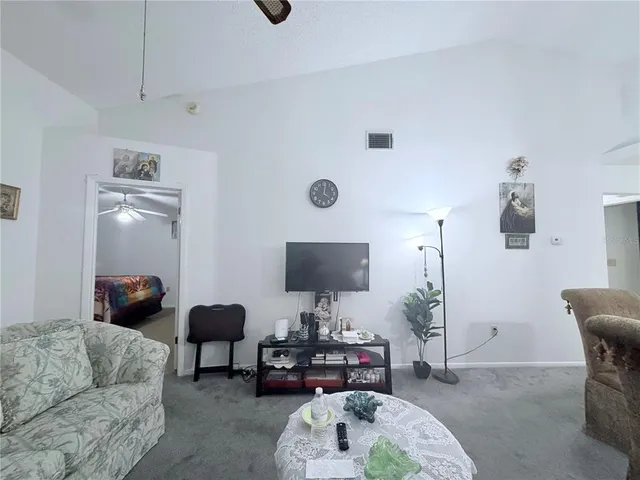 a bathroom with double vanity sink and a mirror