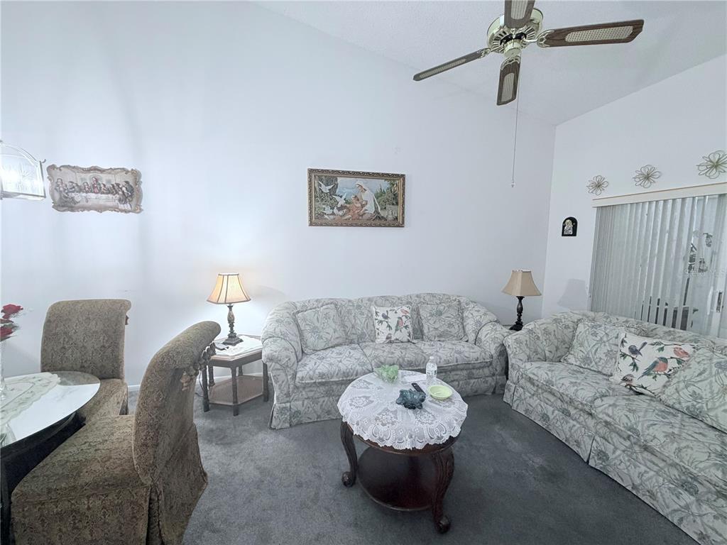 4523 Glen Hollow New Port Richey, FL 34653 - Photo 9 of 62 a living room with furniture and a wooden floor