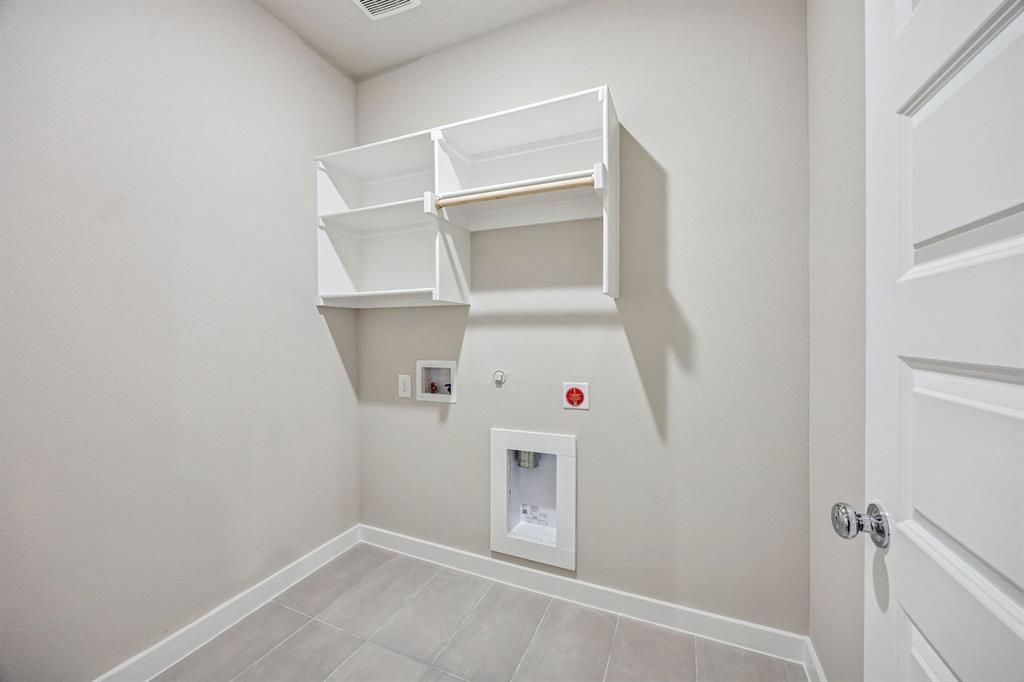 8360 Kingfisher Road Pilot Point, TX 76258 - Photo 17 of 37 Utility Room in the Willow home plan by Trophy Signature Homes – REPRESENTATIVE PHOTO