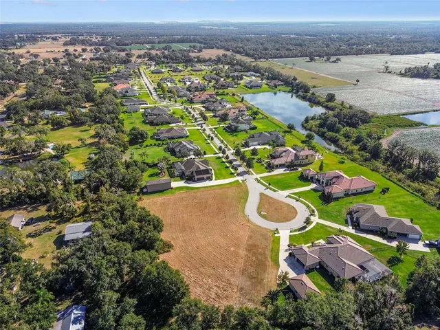 an aerial view of a pool patio and mountain view