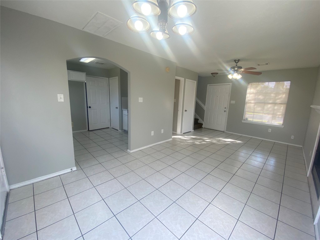 14007 Oleoke Lane Houston, TX 77015 - Photo 4 of 19 an empty room with windows and fan
