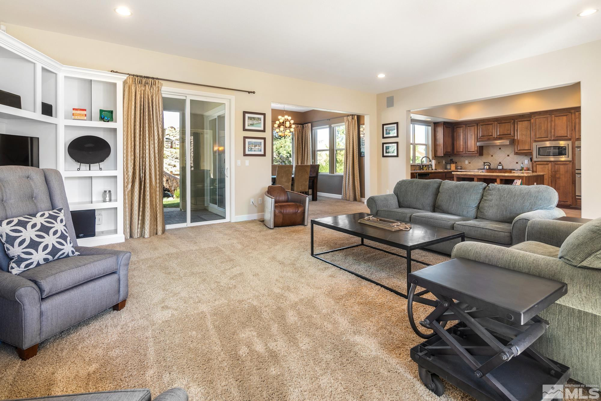 8573 Timaru Trail Reno, NV 89523 - Photo 10 of 40 a living room with furniture and a large window