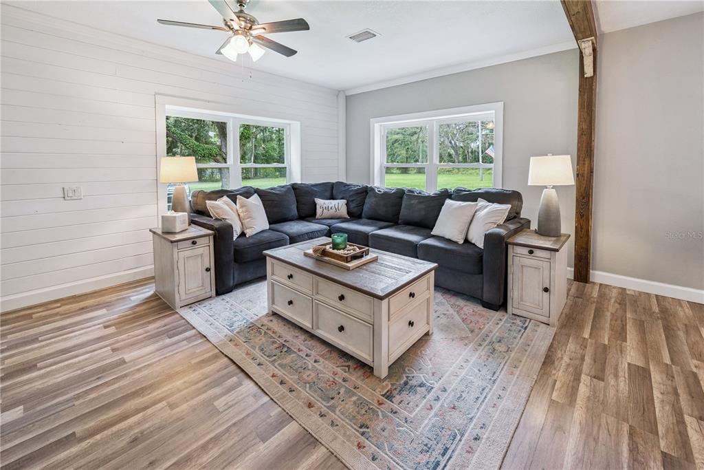 14545 Southwest 155th Avenue Brooker, FL 32622 - Photo 15 of 44 a living room with furniture and a window