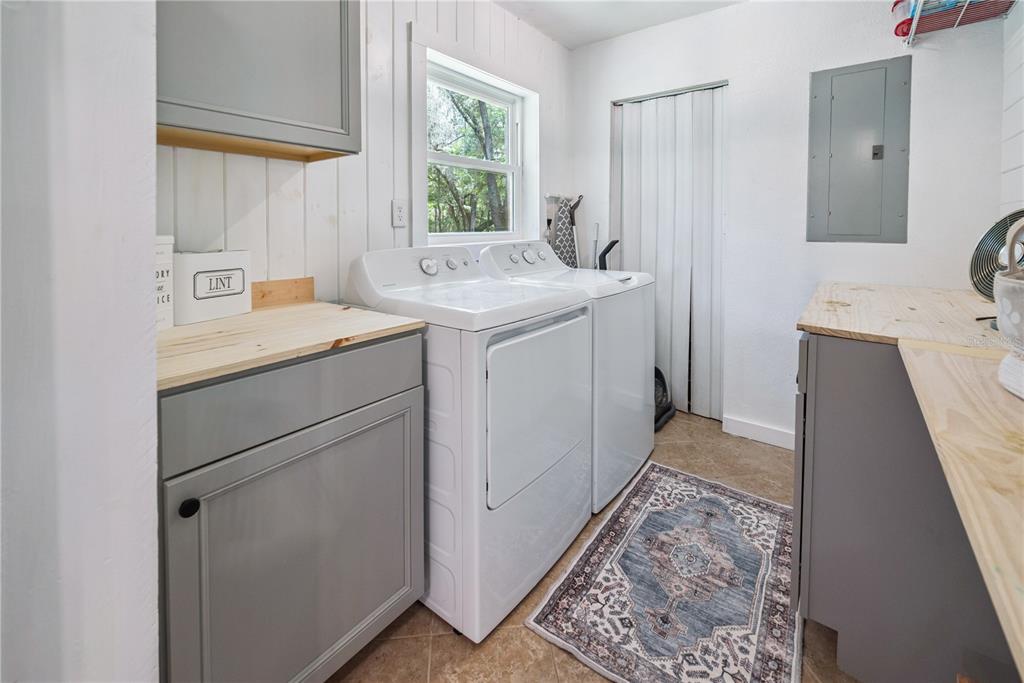 14545 Southwest 155th Avenue Brooker, FL 32622 - Photo 20 of 44 a utility room with a sink a washer and dryer