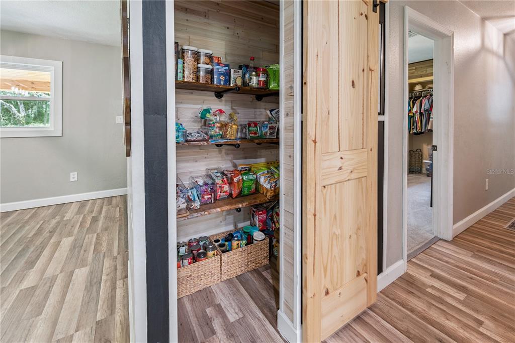 14545 Southwest 155th Avenue Brooker, FL 32622 - Photo 24 of 44 a view of a hallway with closet and a window