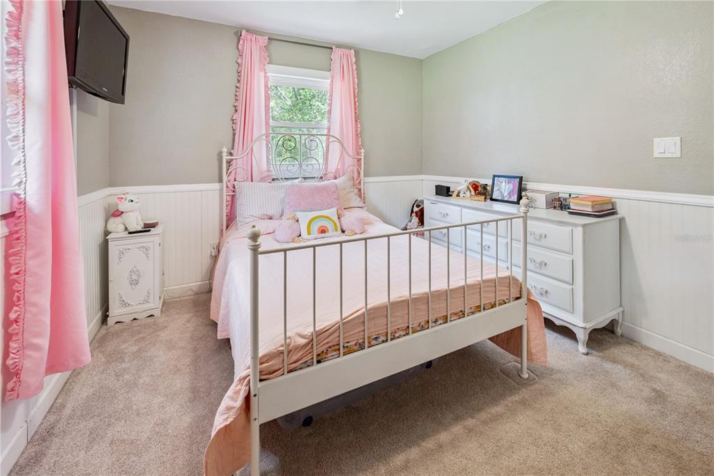 14545 Southwest 155th Avenue Brooker, FL 32622 - Photo 35 of 44 a bedroom with a bed and a window