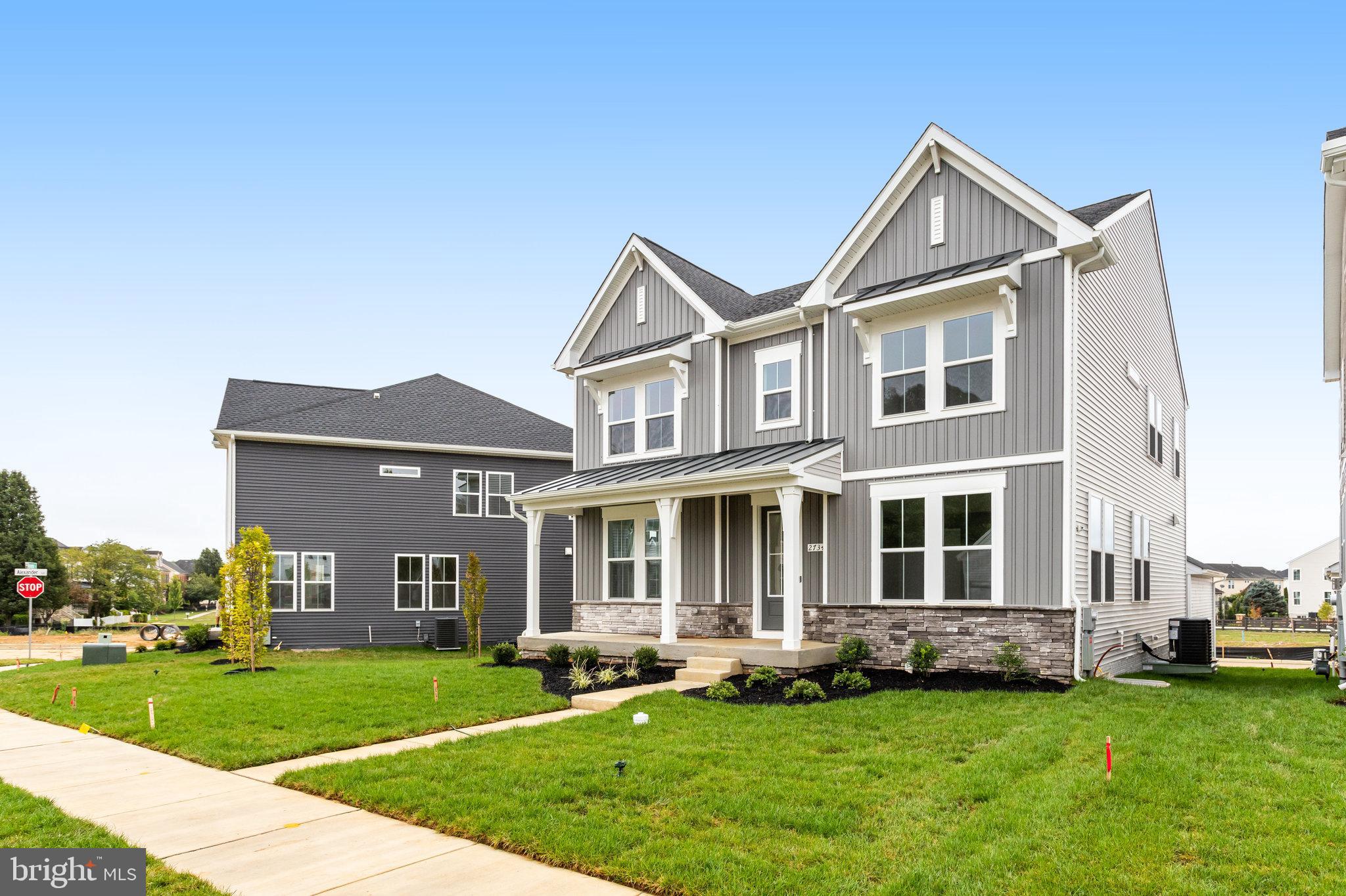 2734 Tuscarora Road Adamstown, MD 21710 - Photo 3 of 85 a front view of a house with a garden