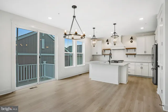 a bathroom with a sink a toilet and a bathtub