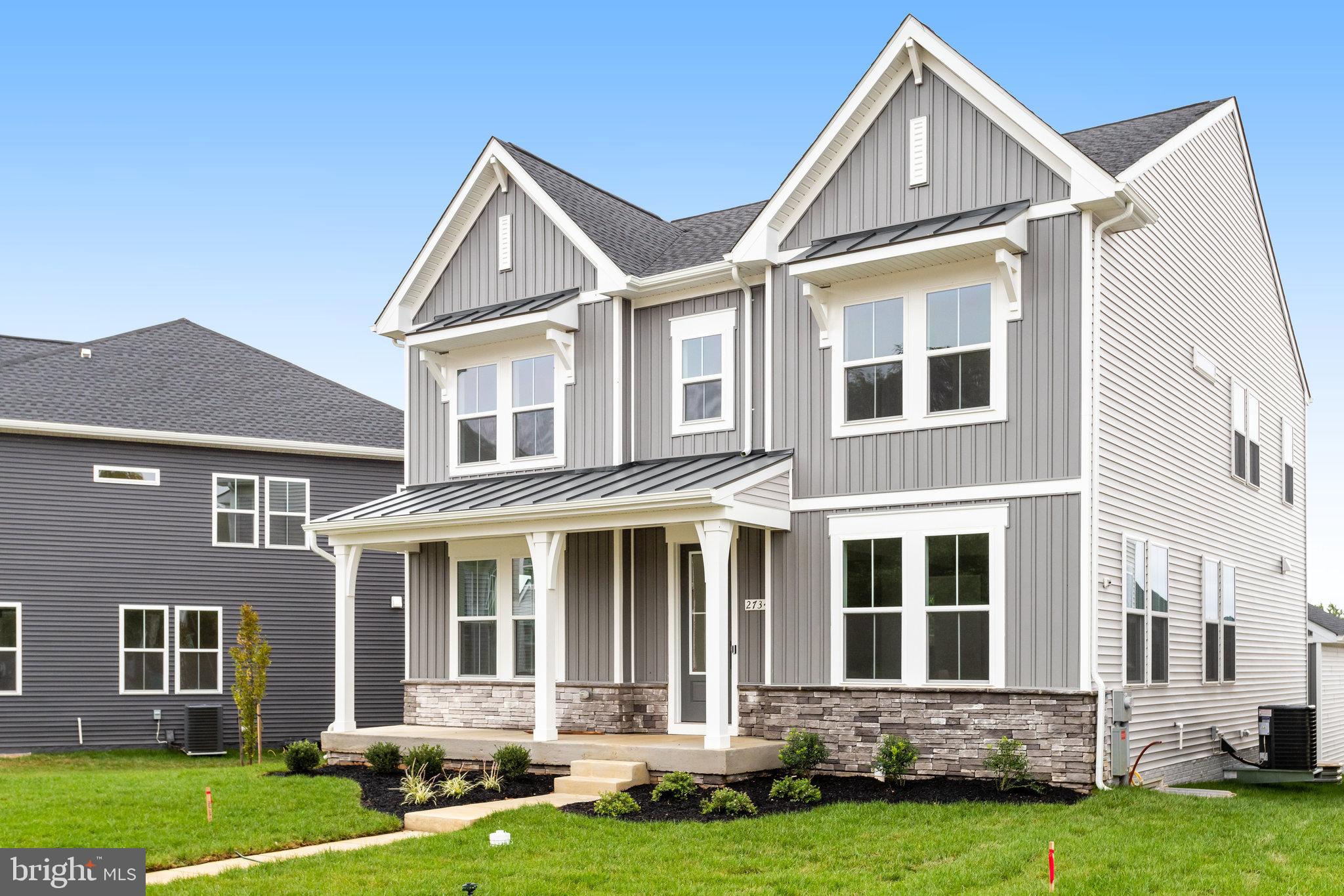 2734 Tuscarora Road Adamstown, MD 21710 - Photo 4 of 85 front view of a house with a yard