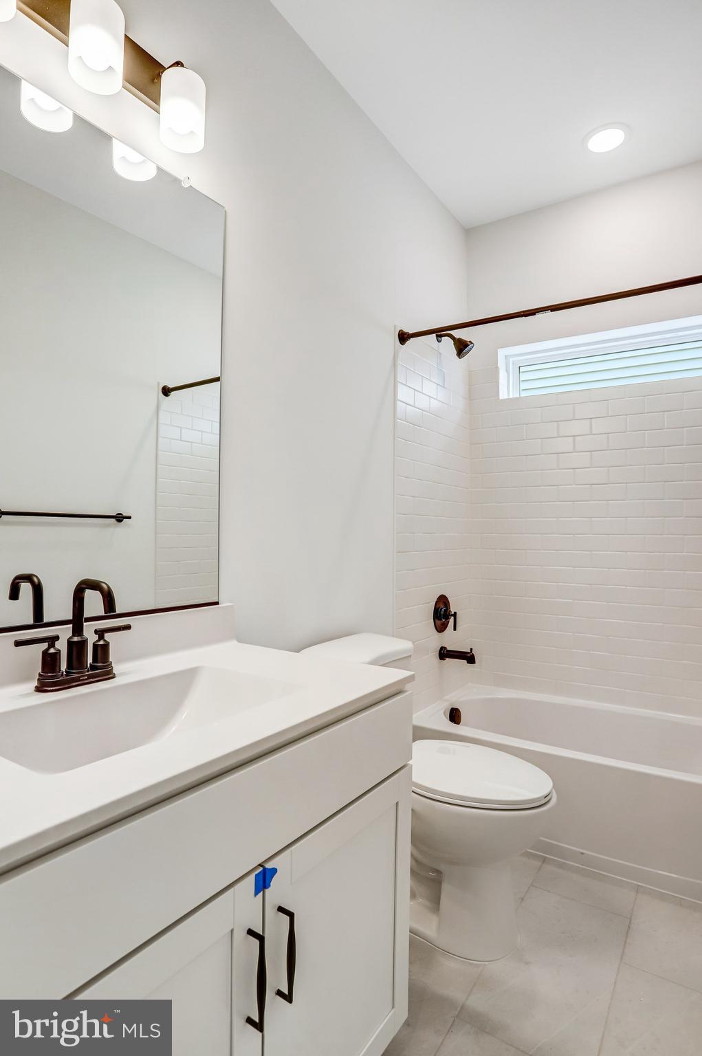 2734 Tuscarora Road Adamstown, MD 21710 - Photo 54 of 85 a bathroom with a sink a toilet and a bathtub