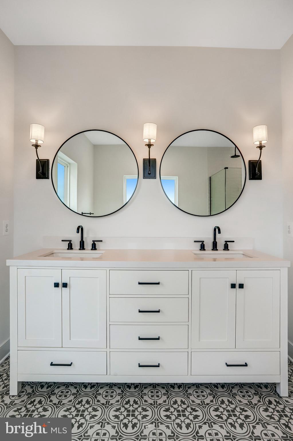 2734 Tuscarora Road Adamstown, MD 21710 - Photo 68 of 85 a bathroom with a sink and a mirror