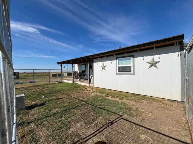 a room with furniture and window