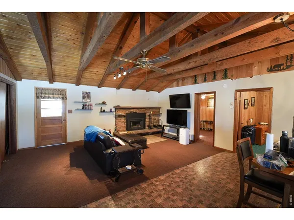 a kitchen with refrigerator a washer and dryer