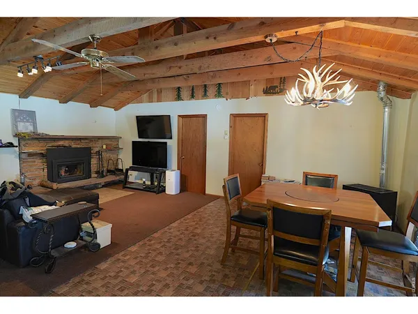 a bathroom with a toilet a sink and a mirror