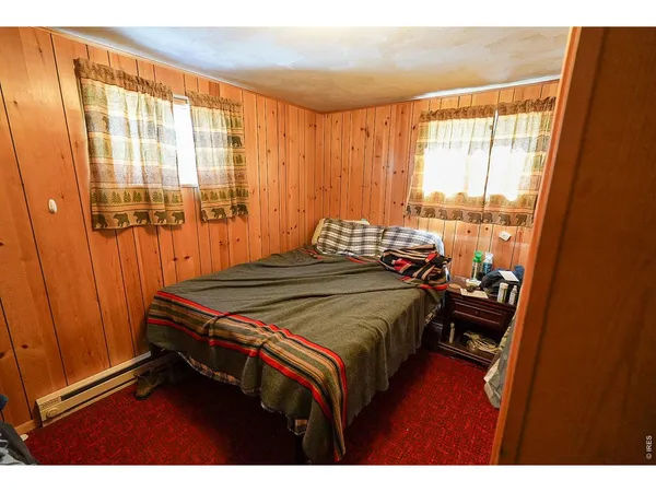 a view of a balcony with wooden floor