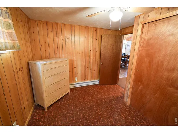 a view of balcony with couch and wooden floor
