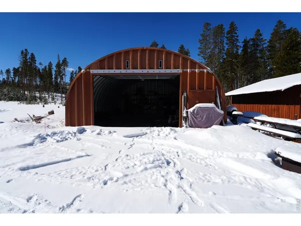 a view of a tree in front of a house
