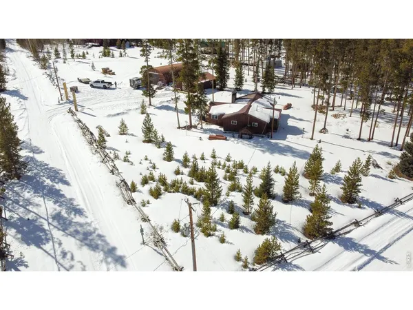a open area with swimming pool and mountain view