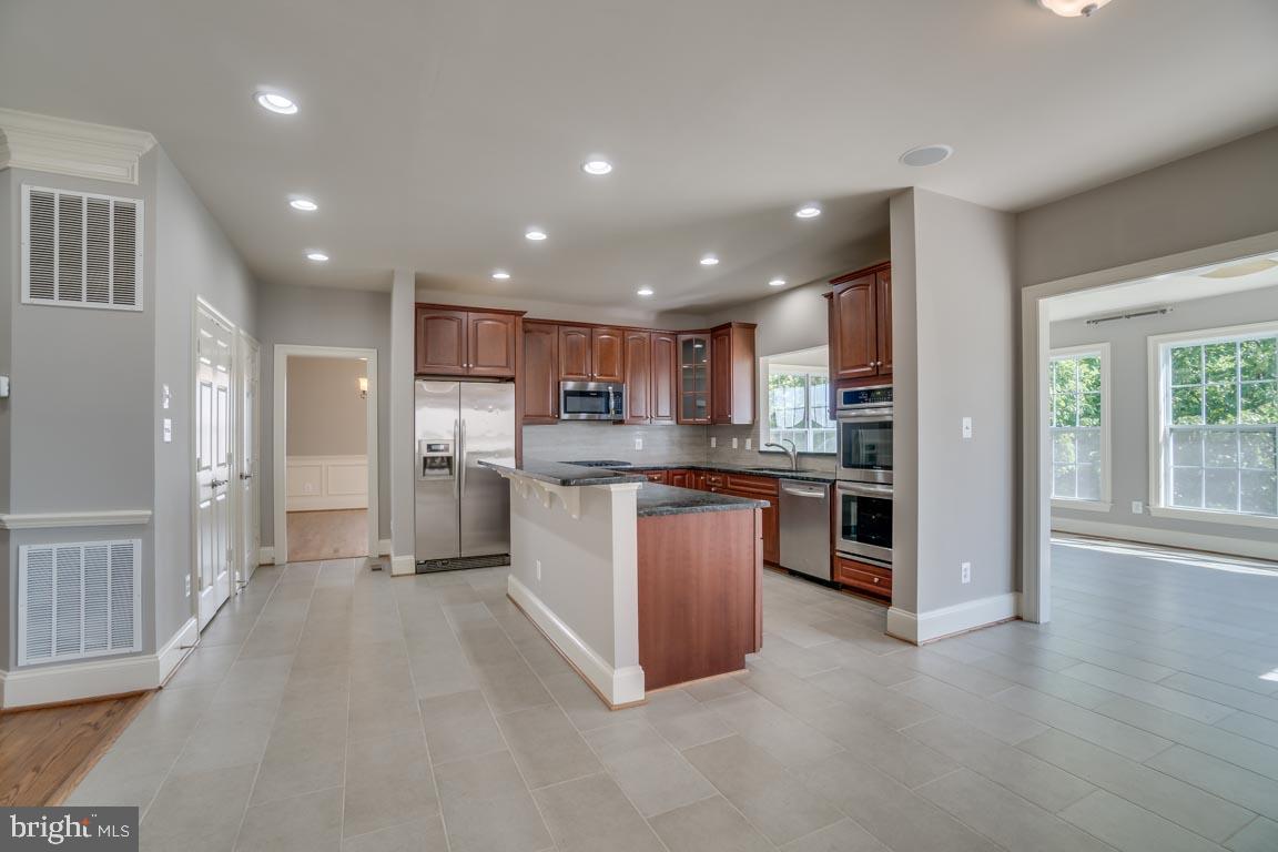 18460 Kerill Road Triangle, VA 22172 - Photo 11 of 47 Large pantry and stainless steel appliances