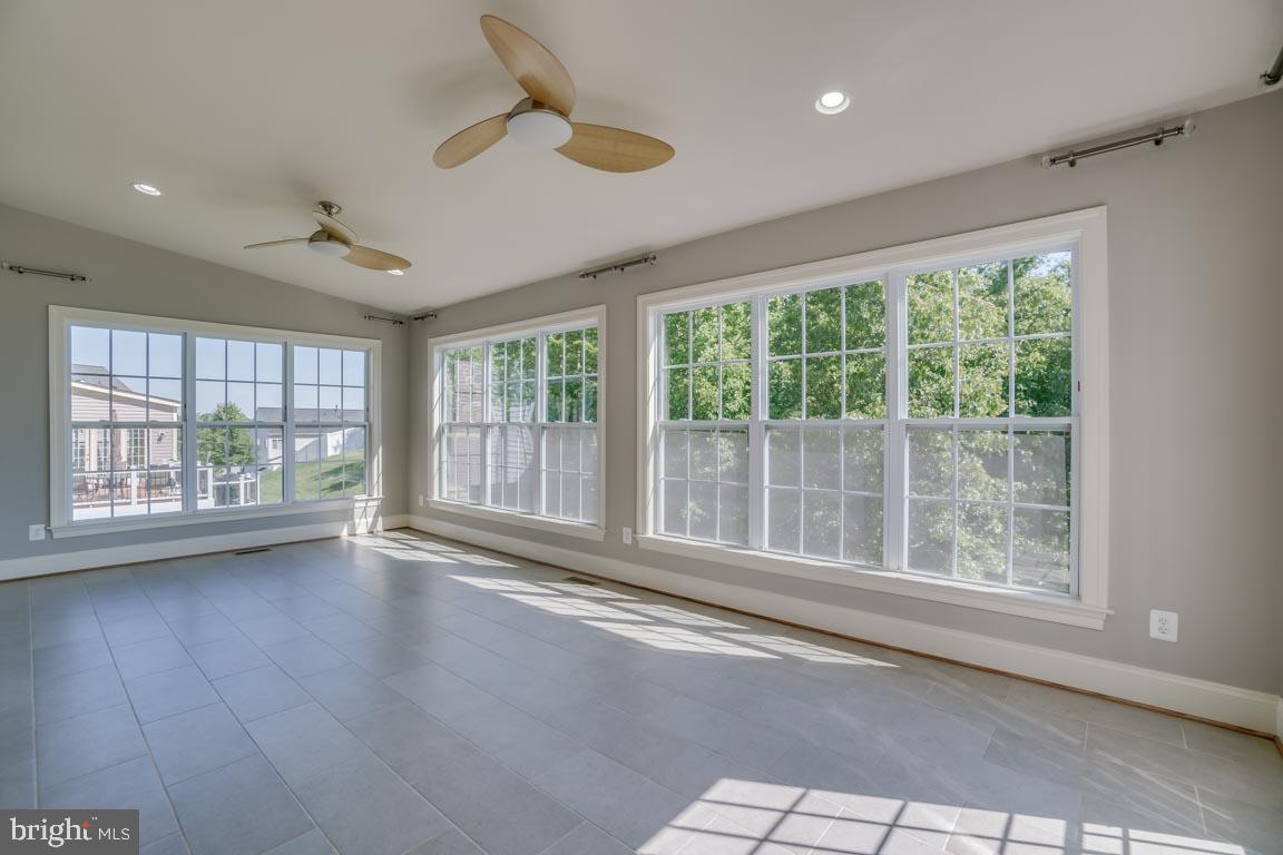 18460 Kerill Road Triangle, VA 22172 - Photo 14 of 47 Sunroom with lots of light and 2 ceiling fans
