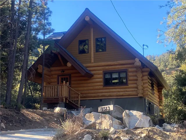 a front view of a house with garage