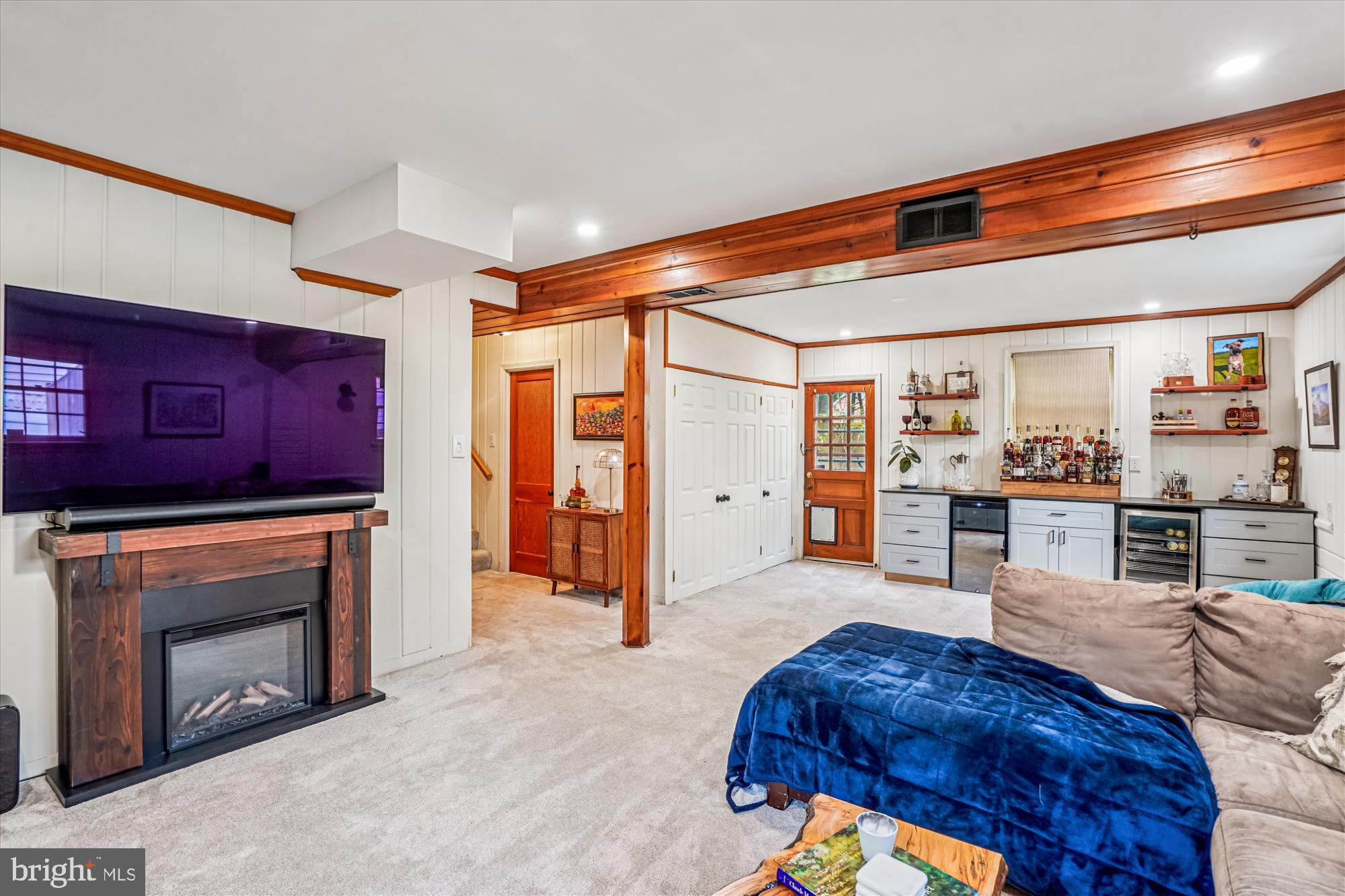 6108 Dorchester Street Springfield, VA 22150 - Photo 14 of 20 a living room with furniture and a fireplace