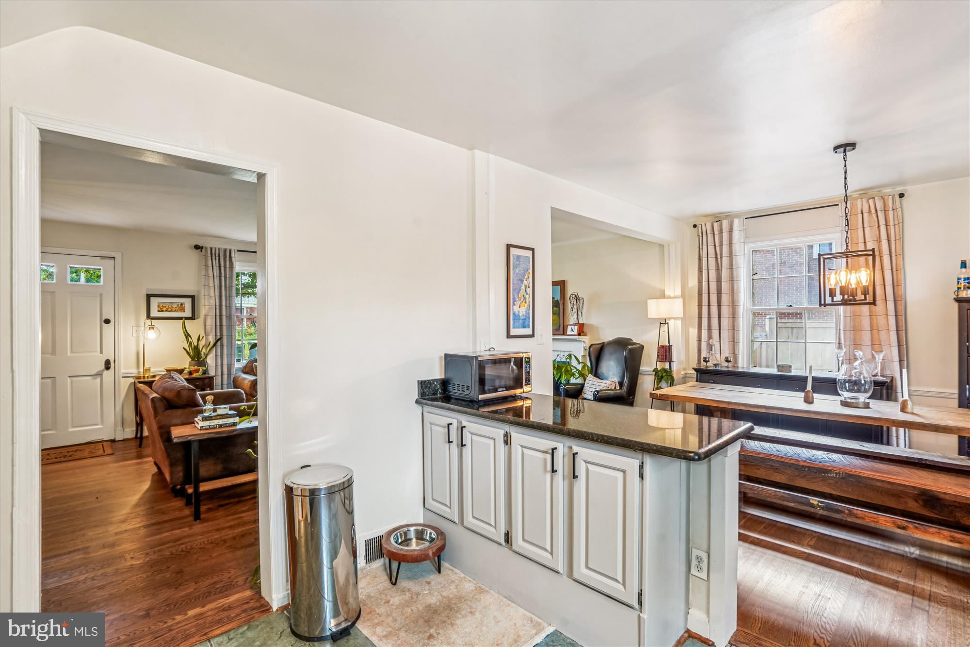 6108 Dorchester Street Springfield, VA 22150 - Photo 6 of 20 a kitchen with sink refrigerator and cabinets