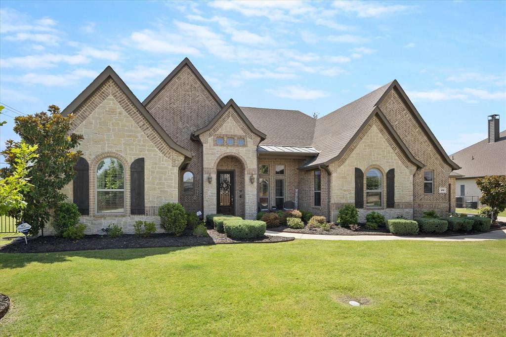 406 Prairie View Road Rockwall, TX 75087 - Photo 4 of 38 Picture perfect curb appeal welcomes your arrival!