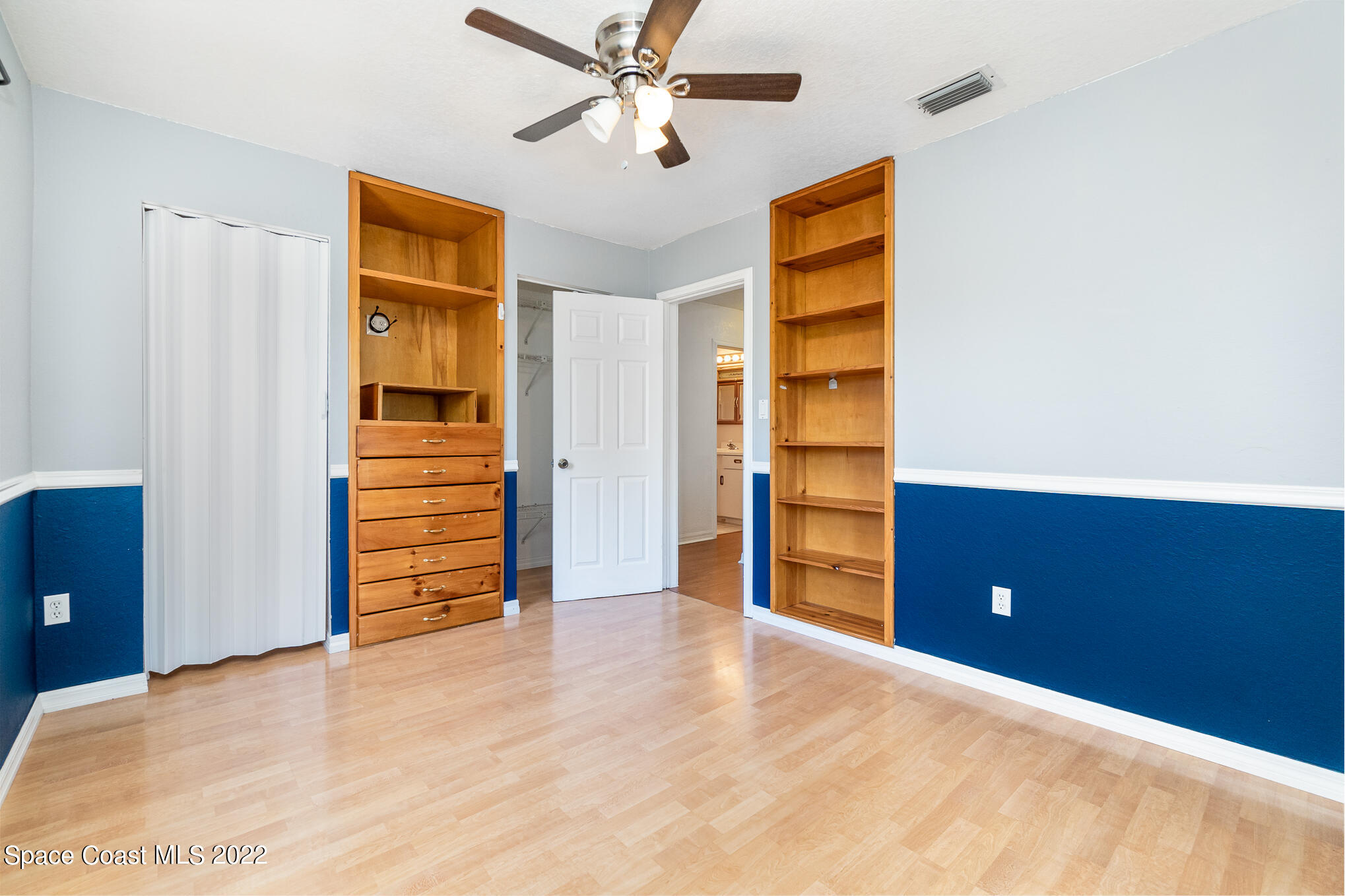 201 Orchid Boulevard Melbourne, FL 32901 - Photo 13 of 36 a view of empty room with wooden floor