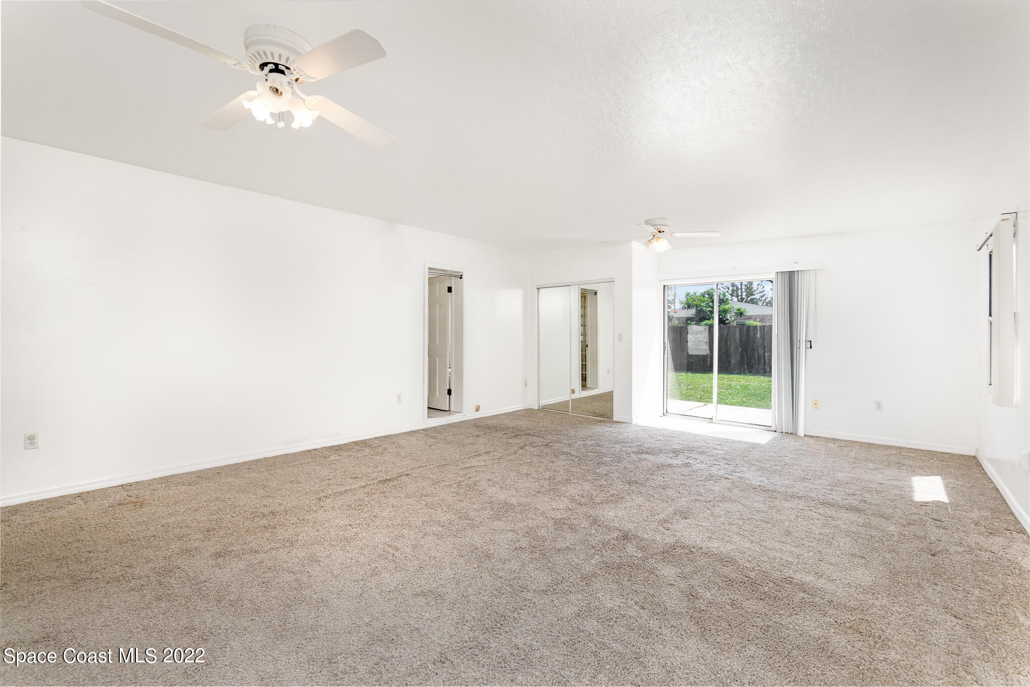 201 Orchid Boulevard Melbourne, FL 32901 - Photo 22 of 36 a view of an empty room with a window