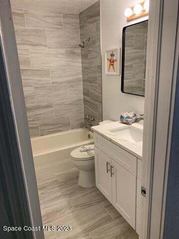 201 Orchid Boulevard Melbourne, FL 32901 - Photo 31 of 36 a bathroom with a sink a toilet and shower