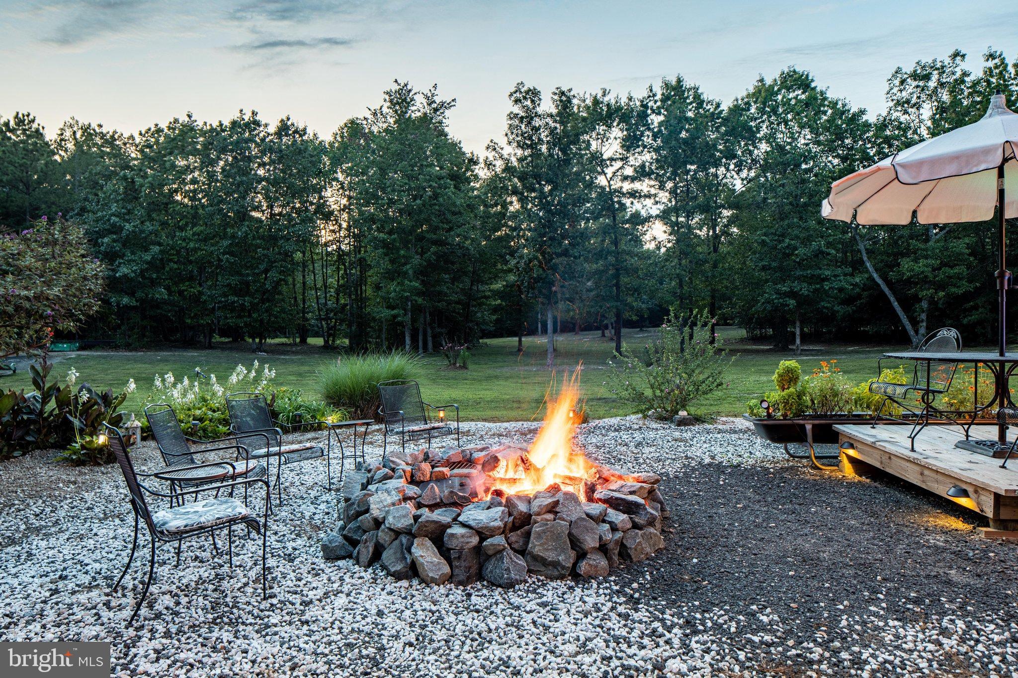 0 Flat Iron Road Montross, VA 22520 - Photo 110 of 116 Cozy fire pit surrounded by nature's beauty.