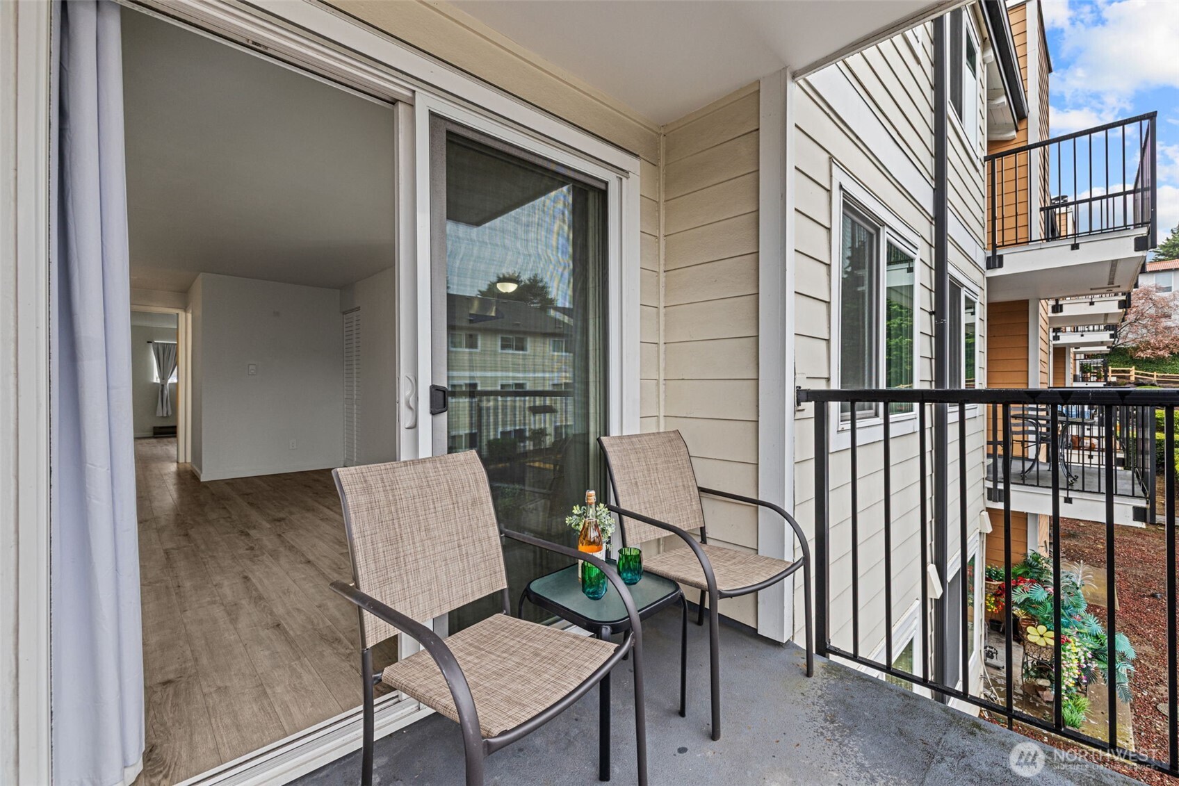 15210 Macadam Road South, Unit D211 Tukwila, WA 98188 - Photo 21 of 26 a view of balcony and patio