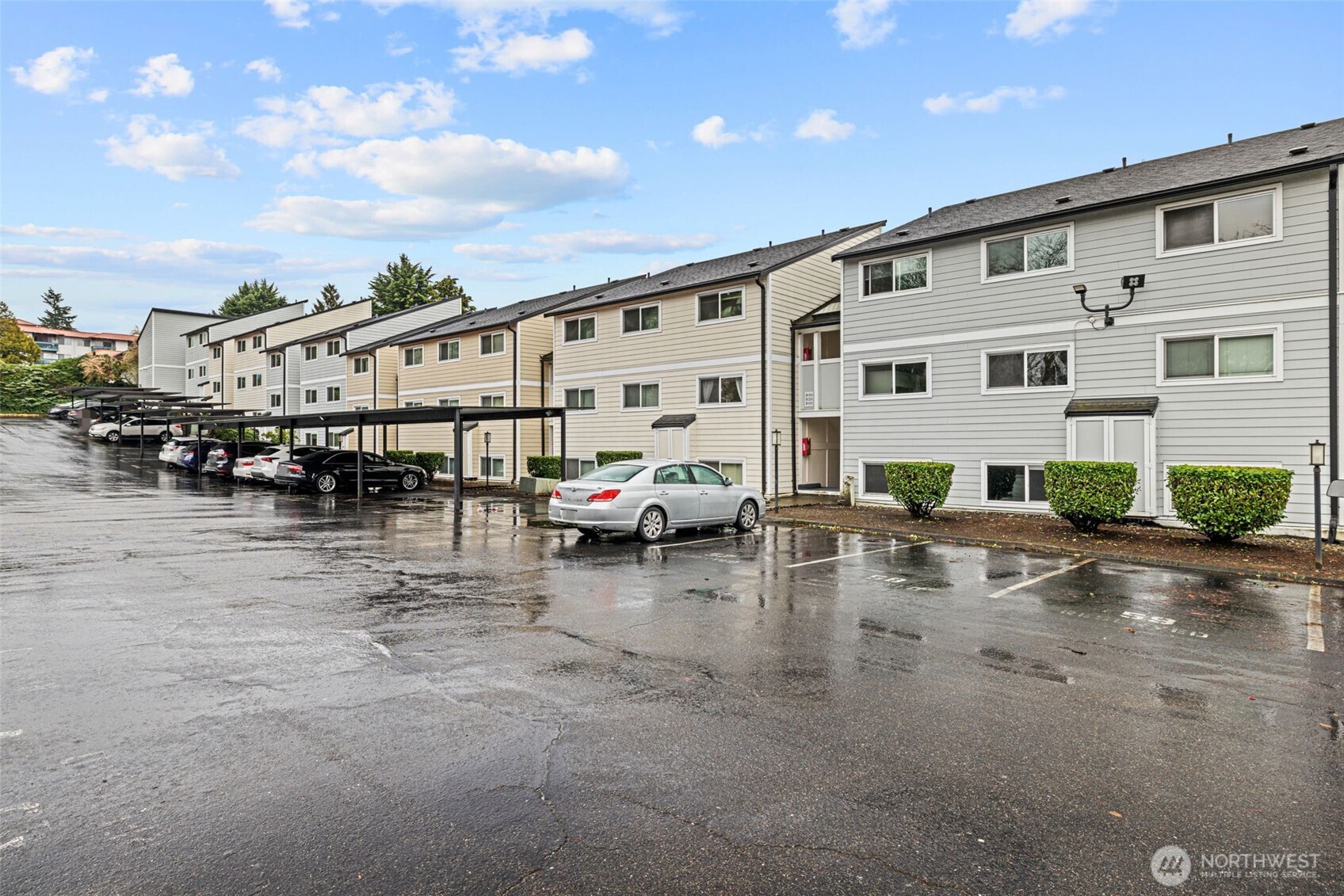 15210 Macadam Road South, Unit D211 Tukwila, WA 98188 - Photo 24 of 26 a view of building with outdoor space