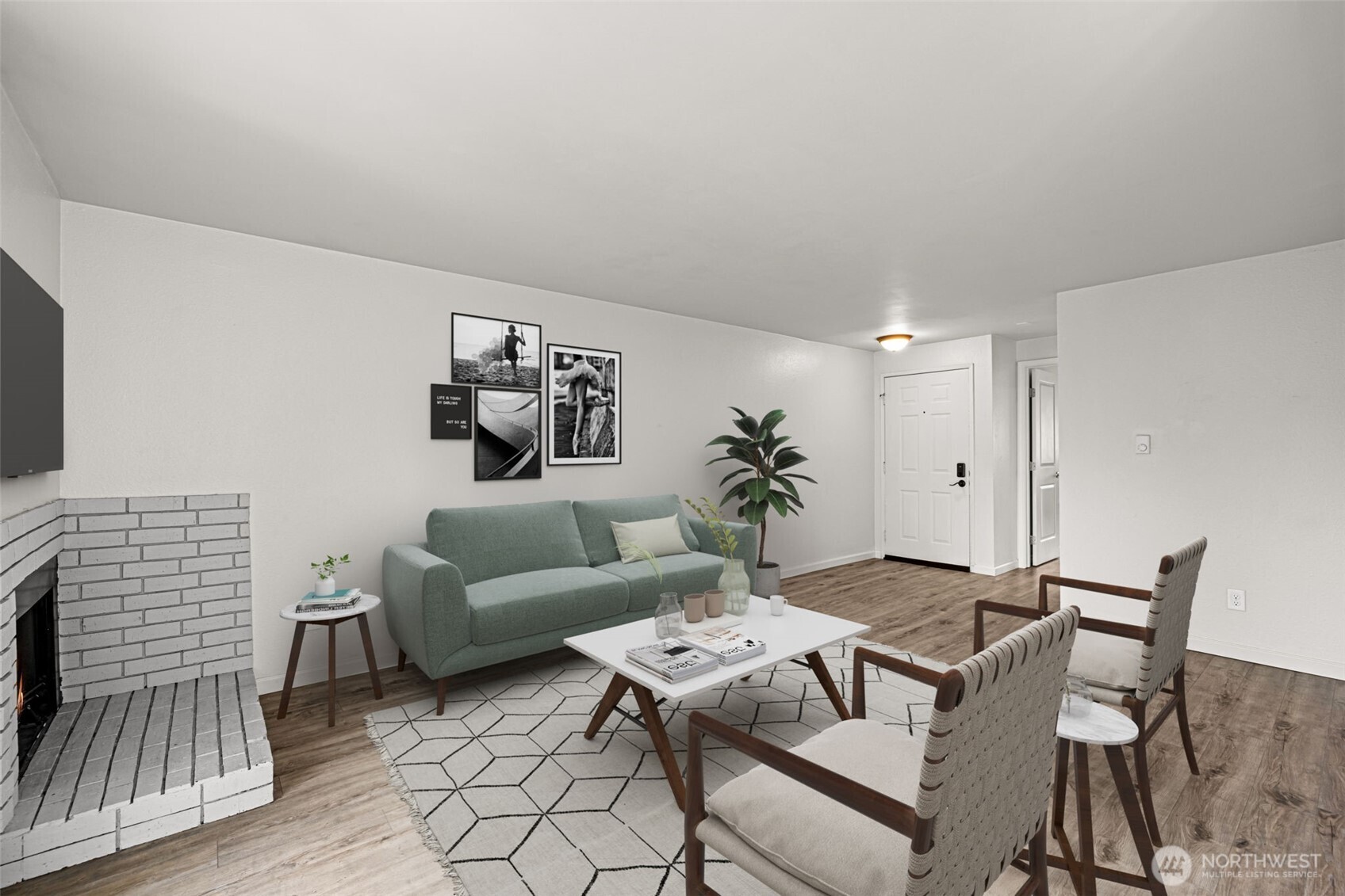 15210 Macadam Road South, Unit D211 Tukwila, WA 98188 - Photo 4 of 26 a living room with furniture and wooden floor