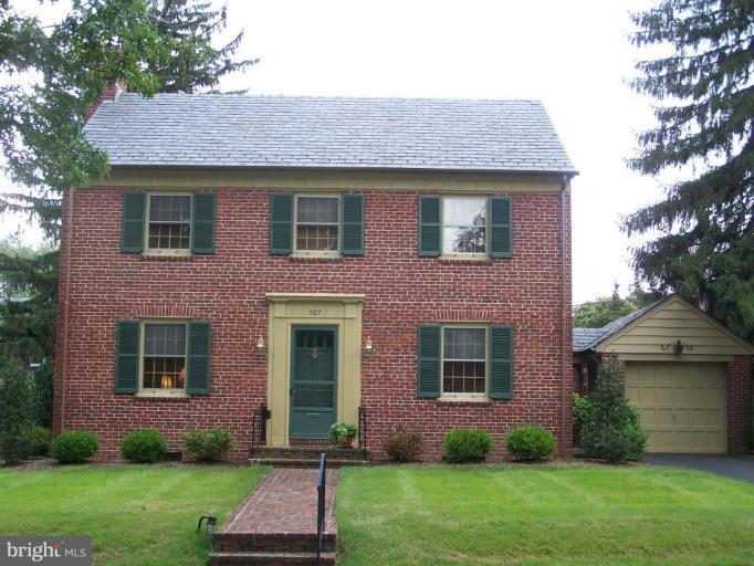 607 Coventry Road Towson, MD 21286 - Photo 1 of 19 a front view of a house with a garden