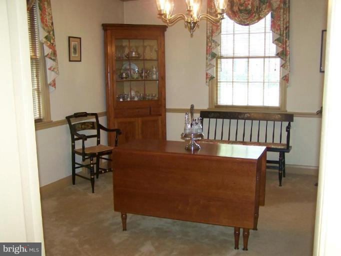 607 Coventry Road Towson, MD 21286 - Photo 4 of 19 a living room with furniture and a window