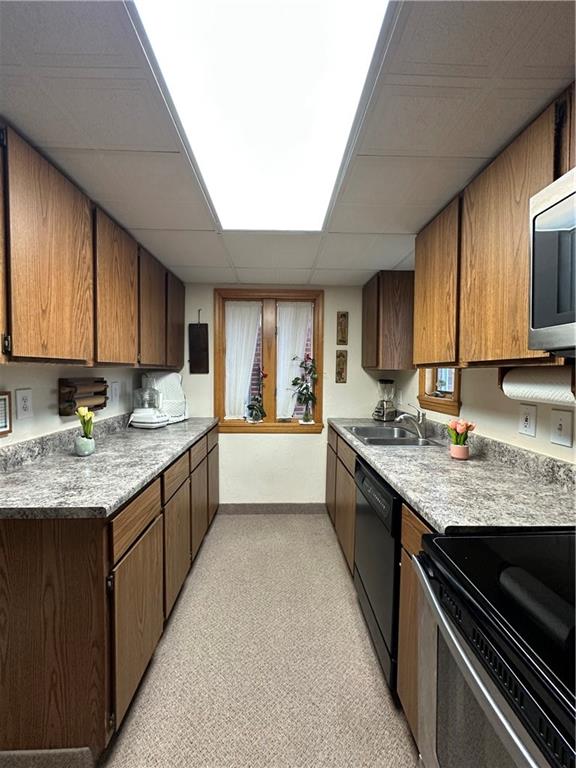802 Dunster Street Pittsburgh, PA 15226 - Photo 13 of 22 a large kitchen with granite countertop lots of counter space sink and cabinets