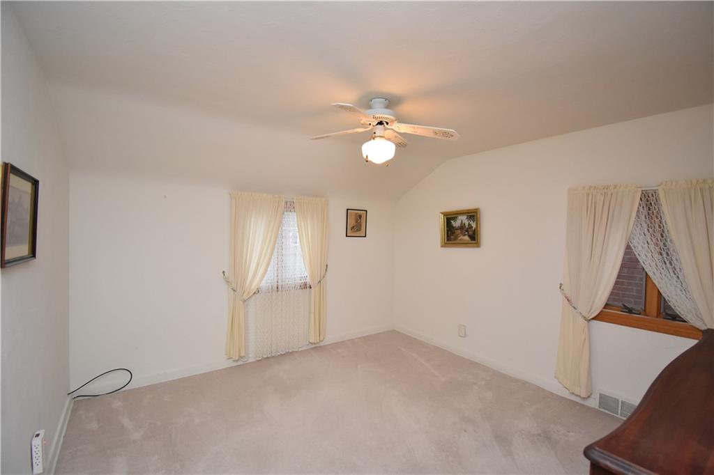 802 Dunster Street Pittsburgh, PA 15226 - Photo 17 of 22 wooden floor in an empty room with a window