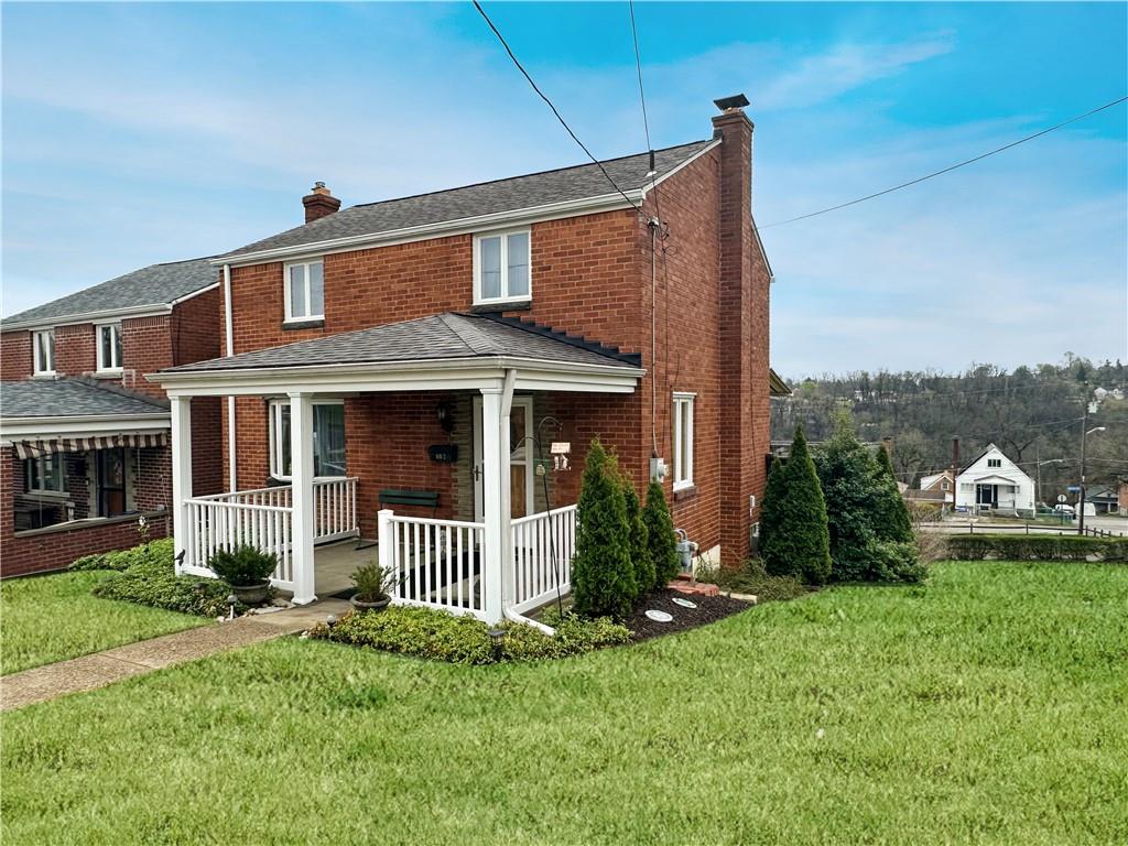 802 Dunster Street Pittsburgh, PA 15226 - Photo 2 of 22 a front view of a house with a yard