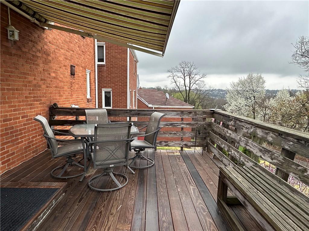 802 Dunster Street Pittsburgh, PA 15226 - Photo 8 of 22 a view of balcony with chairs and wooden floor