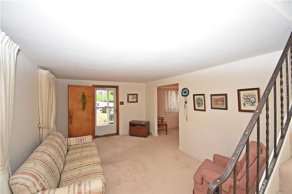 802 Dunster Street Pittsburgh, PA 15226 - Photo 9 of 22 a bedroom with furniture and a couch