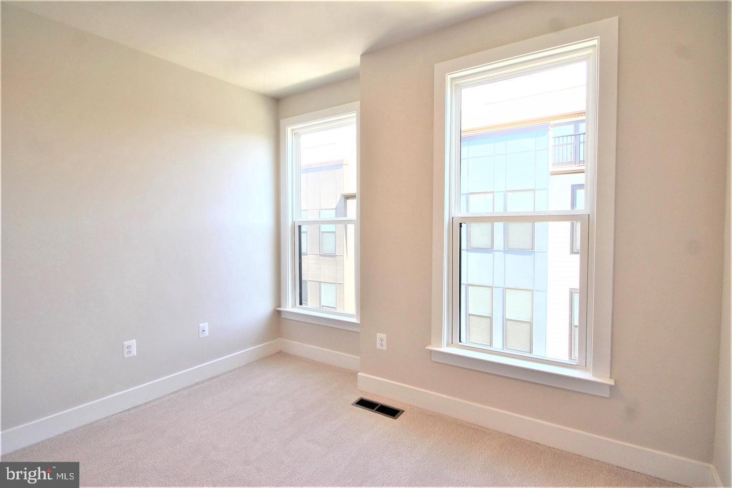 2471 Liberty Loop Herndon, VA 20171 - Photo 27 of 35 an empty room with a window
