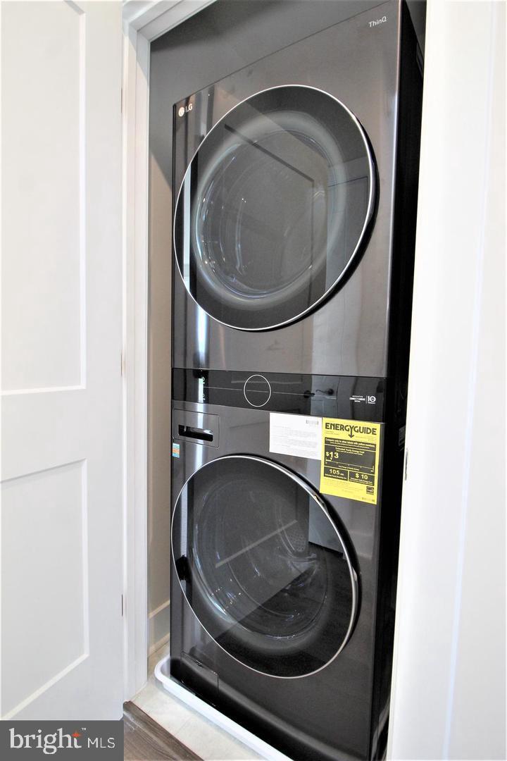 2471 Liberty Loop Herndon, VA 20171 - Photo 28 of 35 a utility room with dryer and washer
